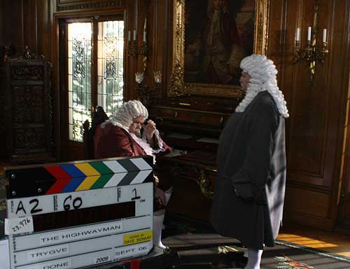 Don Kraus as Lord Shafton and T David Rutherford as Magistrate Quentin in the library