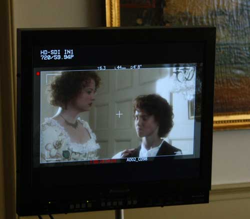 Lady Catherine (Christa Cannon) and Young Henry Stiles (Tom Place) <BR>react to Malcolm's arrest as seen on the monitor of the RED One Camera