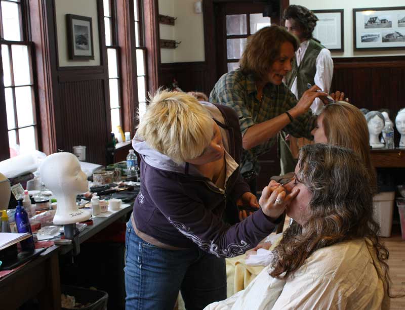 Lorraine Altamura and Lauren Rennels touch up hair and make up.