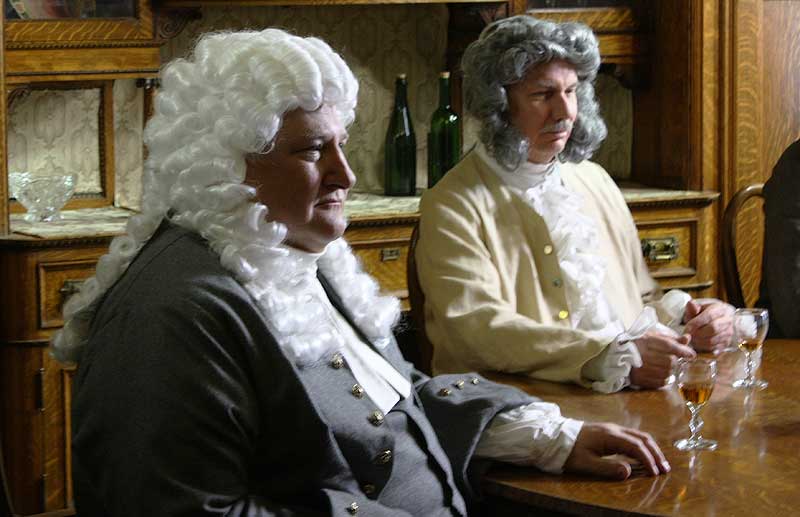 T David Rutherford as Magistrate Quentin and John Aurther Neal as Sam Wilfram
