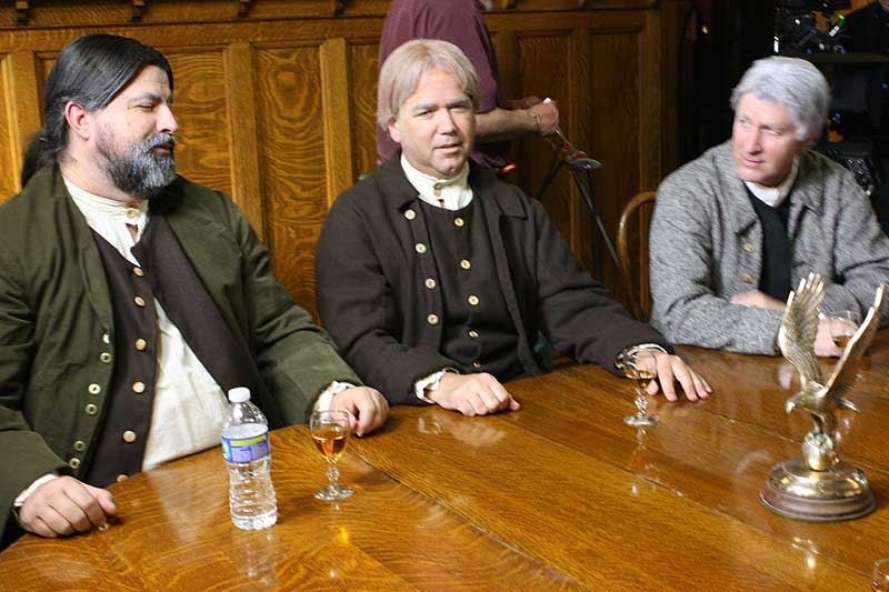 Actors Tom Doyle, Steve Austin and Michael Kempton between takes