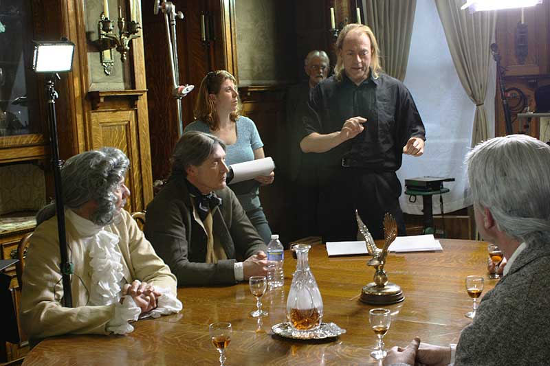 Director Trygve Lode talks to the actors as Nancy Snyder takes notes. <BR>(Rod Greiner, owner of the Zang Mansion, watches over Trygve's shoulder.)